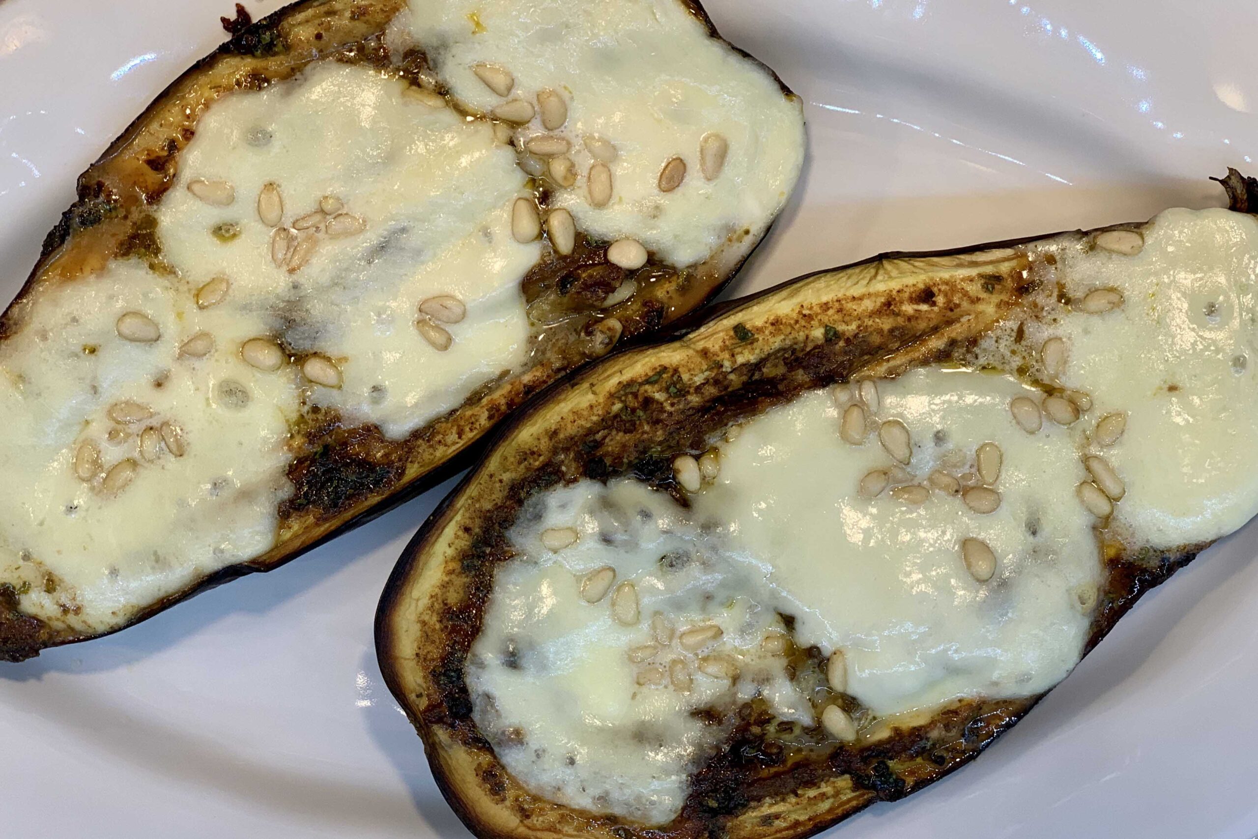 Eggplant with Chermoula, Mozzarella and Pine Nuts